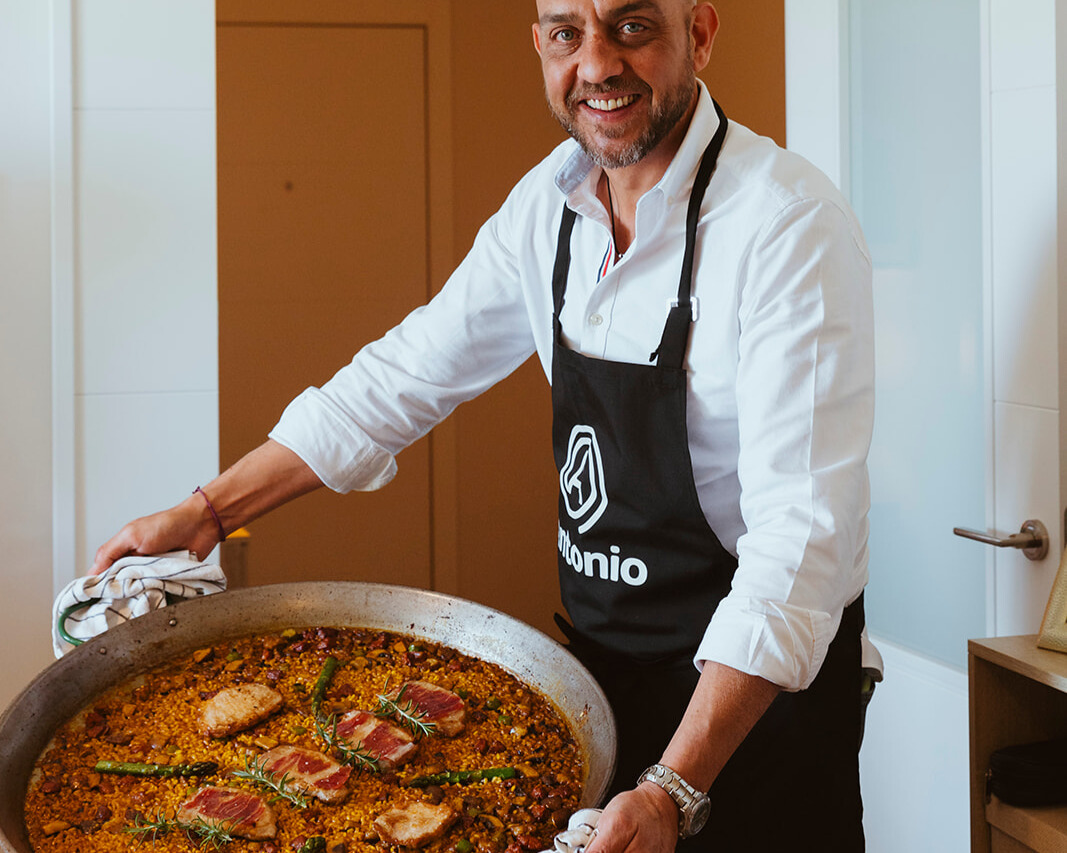 Antonio proudly shows us his award-winning paella