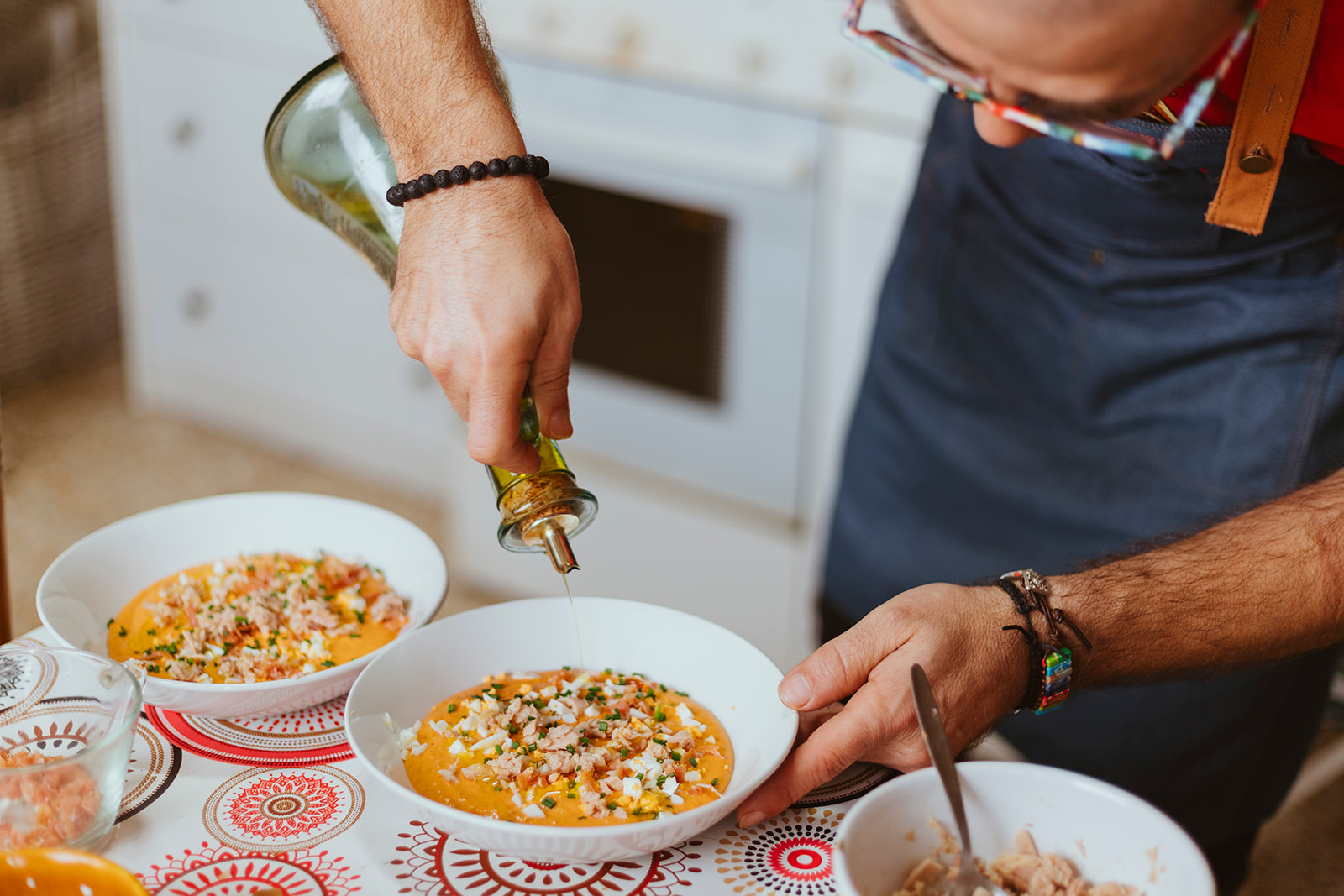 Sergi finishes one of his delicious dishes