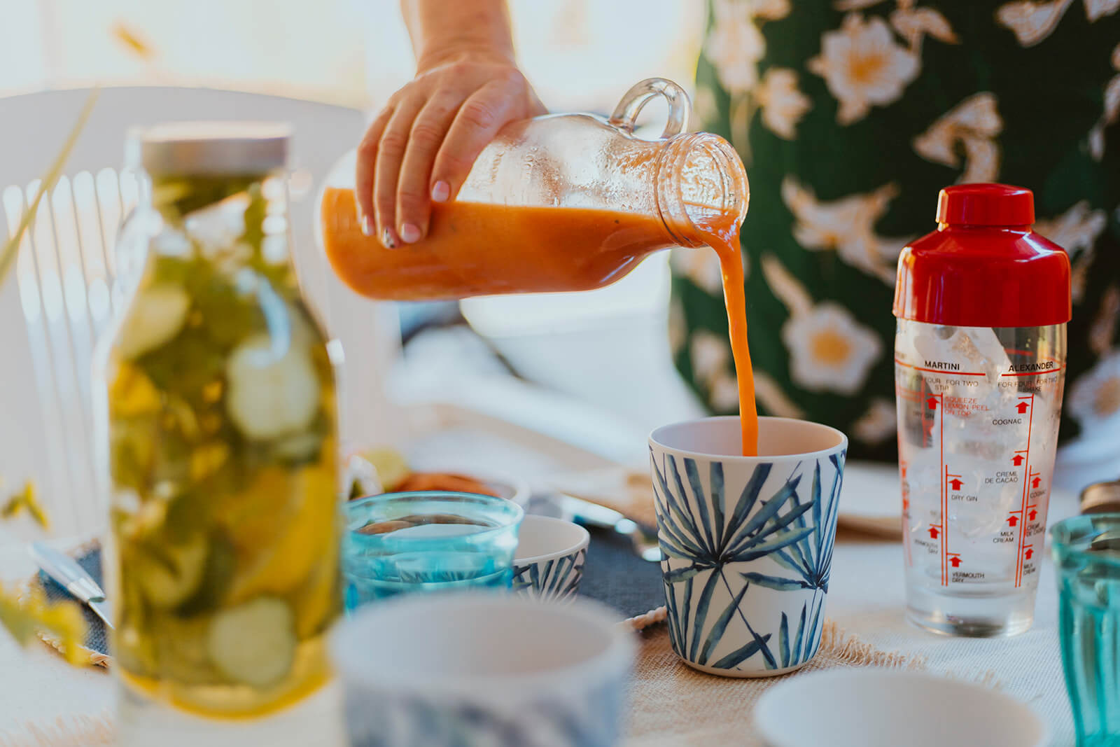 Isabel serves her homemade Gazpacho for her guests.